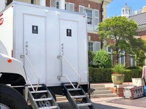 luxury mobile restroom outside a wedding venue