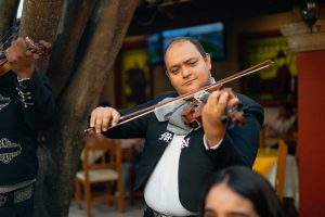 older male mariachi player