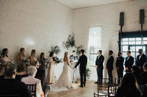 indoor wedding ceremony at One Eleven East