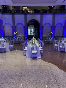 long, white tables at a wedding at Bullock Museum