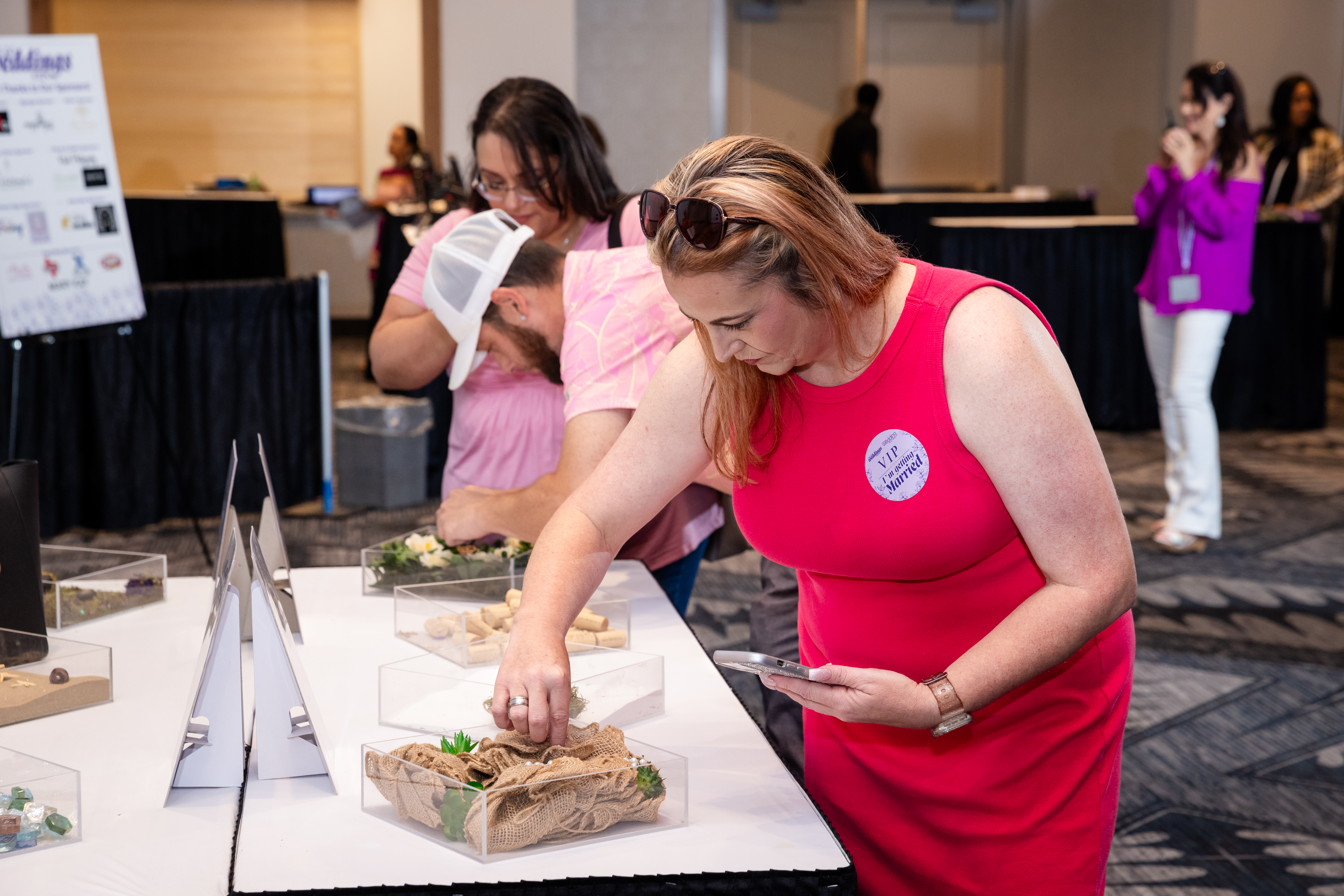 VIP attendee interacting with an Engagement Lounge display